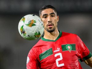 Morocco's defender #2 Achraf Hakimi looks at the ball during the Africa Cup of Nations (CAN) 2024 round of 16 football match between Morocco and South Africa at the Stade Laurent Pokou in San Pedro on January 30, 2024. (Photo by SIA KAMBOU / AFP)