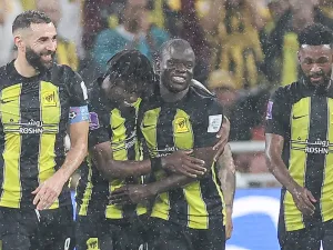 Ittihad's French forward #09 Karim Benzema (L) and Ittihad's French midfielder #07 N'Golo Kante (C) celebrate after a goal during the FIFA Club World Cup first round football match between Al-Ittihad and Auckland City at the King Abdullah Sports City stadium in Jeddah, on December 12, 2023. Al Ittihad secured progress from the first round of the Club World Cup with a convincing 3-0 win against Auckland City. (Photo by AFP)
