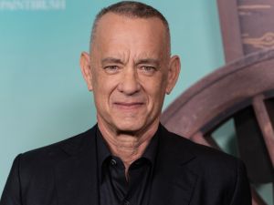 QAnon is a conspiracy theory that accused Tom Hanks of pedophilia. (Lev Radin/ Shutterstock)