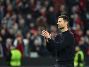 Bayer Leverkusen's Spanish head coach Xabi Alonso celebrates at the end of the UEFA Europa League Group round of 16, second-leg football match between Bayer 04 Leverkusen and Garabagh in Leverkusen, western Germany on March 14, 2024. Bayer Leverkusen won the match 3-2. (Photo by INA FASSBENDER / AFP)
