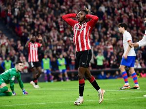 Athletic Bilbao's Spanish forward #11 Nico Williams reacts to missing a goal opportunity during the Spanish Copa del Rey (King's Cup) quarter final football match between Athletic Club Bilbao and FC Barcelona at the San Mames stadium in Bilbao on January 24, 2024. (Photo by ANDER GILLENEA / AFP)