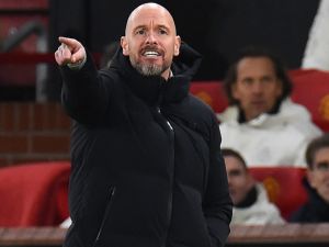 Manchester United's Dutch manager Erik ten Hag gestures from the sideline during the UEFA Champions League group A football match between Manchester United and FC Bayern Munich at Old Trafford stadium in Manchester, north west England, on December 12, 2023. (Photo by PETER POWELL / AFP)