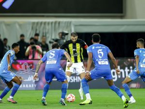 Ittihad's French forward #09 Karim Benzema is marked by Hilal's Saudi midfielder #28 Mohamed Kanno, Portuguese midfielder #08 Ruben Neves, Saudi defender #05 Ali al-Bulaihi, and Saudi midfielder #07 Salman Al-Faraj during the Saudi Pro League football match between Al-Ittihad and Al-Hilal at Prince Abdullah al-Faisal Stadium in Jeddah on September 1, 2023. (Photo by AFP)