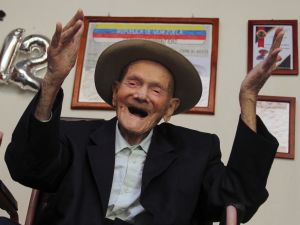 112-year-old Venezuelan farmer Juan Vicente Pérez gestures at his home in San Jose de Bolivar, Tachira state, Venezuela. (Photo by Jhonny PARRA / AFP) Venezuela