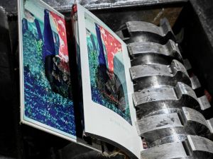Unwanted wedding photos being destroyed by a shredding machine at a warehouse in Langfang. (Photo by Jade GAO and Jade GAO / AFP) Divorced
