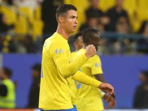 Nassr's Portuguese forward #07 Cristiano Ronaldo celebrates after scoring during the Saudi Pro League football match between Al-Nassr and Al-Tai in Riyadh's Al-Awal Park Stadium on March 30, 2024. (Photo by Fayez NURELDINE / AFP)
