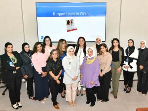 A group photo of Burgan Bank employees at the ‘Burgan Lean in Circle’ workshop