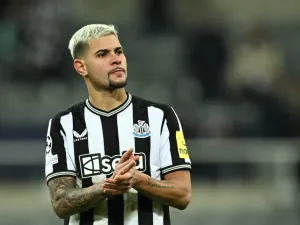 Newcastle United's Brazilian midfielder #39 Bruno Guimaraes applauds at the end of the UEFA Champions League Group F football match between Newcastle United and AC Milan at St James' Park in Newcastle-upon-Tyne, north east England on December 13, 2023. AC Milan wins 2 - 1 against Newcastle United and qualifies for the Champions League last 16. (Photo by Paul ELLIS / AFP)