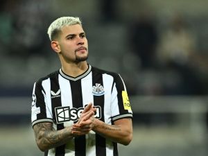 Newcastle United's Brazilian midfielder #39 Bruno Guimaraes applauds at the end of the UEFA Champions League Group F football match between Newcastle United and AC Milan at St James' Park in Newcastle-upon-Tyne, north east England on December 13, 2023. AC Milan wins 2 - 1 against Newcastle United and qualifies for the Champions League last 16. (Photo by Paul ELLIS / AFP)