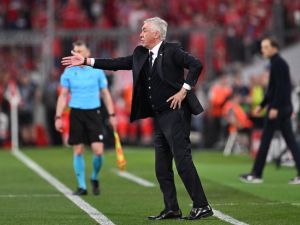 Real Madrid's Italian coach Carlo Ancelotti gestures during the UEFA Champions League semi-final first leg football match between FC Bayern Munich and Real Madrid CF on April 30, 2024 in Munich, southern Germany. (Photo by Kirill KUDRYAVTSEV / AFP)