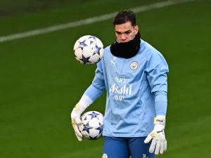 Manchester City's Brazilian goalkeeper Ederson attends a team training session at Manchester City's training ground in north-west England on November 27, 2023, ahead of their UEFA Champions League Group G football match against RB Leipzig. (Photo by Paul ELLIS / AFP)