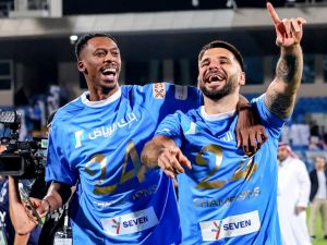 Hilal's players celebrate their 19th Saudi Pro League title after their football match against Al-Hazem at the Kingdom Arena stadium in Riyadh on May 11, 2024. (Photo by Fayez NURELDINE / AFP)