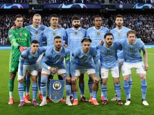 Man City players pose for team photo during the UEFA Champions League quarter-final second-leg football match between Manchester City and Real Madrid, at the Etihad Stadium, in Manchester, north-west England, on April 17, 2024. (Photo by Darren Staples / AFP)