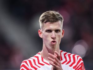 Leipzig's Spanish forward #07 Dani Olmo reacs during the UEFA Champions League Round of 16, first-leg football match between RB Leipzig and Real Madrid CF in Leipzig, eastern Germany, on February 13, 2024. (Photo by Ronny Hartmann / AFP)