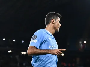 Manchester City's Spanish midfielder #16 Rodri celebrates scoring his team third goal during the UEFA Champions League Group G football match between Manchester City and FC Crvena Zvezda (Red Star Belgrade) at the Etihad Stadium in Manchester, north west England, on September 19, 2023. (Photo by Oli SCARFF / AFP)