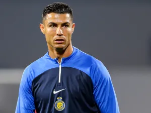 Nassr's Portuguese forward #07 Cristiano Ronaldo looks on as he warms up before the Saudi Pro League football match between Damac FC and Al-Nassr FC at Prince Sultan bin Abdulaziz Sports City stadium in Abha on April 5, 2024. (Photo by Mohammed ALSHEHRI / AFP)