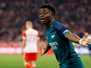 Arsenal's English midfielder #07 Bukayo Saka reacts during the UEFA Champions League quarter-final second leg football match between FC Bayern Munich and Arsenal FC in Munich, southern Germany on April 17, 2024. (Photo by Michaela STACHE / AFP)