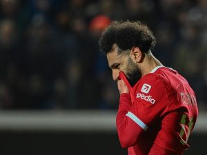 Liverpool's Egyptian forward #11 Mohamed Salah reacts during the UEFA Europa League quarter-final second leg football match between Atalanta BC and Liverpool FC at the Atleti Azzurri d'Italia Stadium in Bergamo, on April 18, 2024. (Photo by Isabella BONOTTO / AFP)