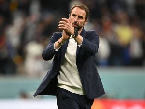 England's coach #00 Gareth Southgate reacts at the end of the Qatar 2022 World Cup quarter-final football match between England and France at the Al-Bayt Stadium in Al Khor, north of Doha, on December 10, 2022. (Photo by Paul ELLIS / AFP)