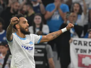 Marseille's French-Gabonese forward #10 Pierre-Emerick Aubameyang celebrates after scoring his team's first goal during the French L1 football match between Olympique Marseille (OM) and FC Lorient at the Stade Velodrome in Marseille, southern France, on May 12, 2024. (Photo by Nicolas TUCAT / AFP)
