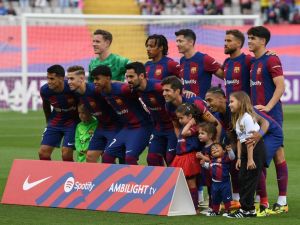 Barcelona's players pose for a team picture before the start of the Spanish League football match between FC Barcelona and Rayo Vallecano de Madrid at the Estadi Olimpic Lluis Companys in Barcelona on May 19, 2024. (Photo by MANAURE QUINTERO / AFP) Barcelona's players pose for a team picture before the start of the Spanish League football match between FC Barcelona and Rayo Vallecano de Madrid at the Estadi Olimpic Lluis Companys in Barcelona on May 19, 2024. (Photo by MANAURE QUINTERO / AFP)