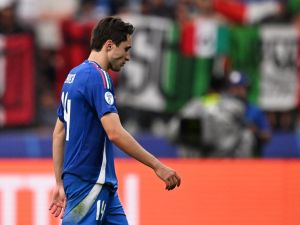 Italy's forward #14 Federico Chiesa reacts at the end of the UEFA Euro 2024 round of 16 football match between Switzerland and Italy at the Olympiastadion Berlin in Berlin on June 29, 2024. (Photo by Kirill KUDRYAVTSEV / AFP) Italy's forward #14 Federico Chiesa reacts at the end of the UEFA Euro 2024 round of 16 football match between Switzerland and Italy at the Olympiastadion Berlin in Berlin on June 29, 2024. (Photo by Kirill KUDRYAVTSEV / AFP)