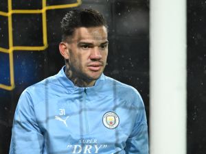 Manchester City's Brazilian goalkeeper #31 Ederson looks on during a warm-up session prior the UEFA Champions League Group G football match between Young Boys (SUI) and Manchester City (ENG) at The Wankdorf Stadium, in Bern on October 25, 2023. (Photo by Fabrice COFFRINI / AFP)