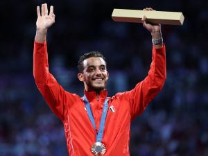 Bronze medallist Egypt's Mohamed Elsayed celebrates on the podium during the medal ceremony for the men's epee individual competition during the Paris 2024 Olympic Games at the Grand Palais in Paris, on July 28, 2024. (Photo by Franck FIFE / AFP) Bronze medallist Egypt's Mohamed Elsayed celebrates on the podium during the medal ceremony for the men's epee individual competition during the Paris 2024 Olympic Games at the Grand Palais in Paris, on July 28, 2024. (Photo by Franck FIFE / AFP)