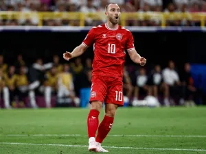 Denmark's midfielder #10 Christian Eriksen reacts to a missed chance during the UEFA Euro 2024 round of 16 football match between Germany and Denmark at the BVB Stadion Dortmund in Dortmund on June 29, 2024. (Photo by KENZO TRIBOUILLARD / AFP)