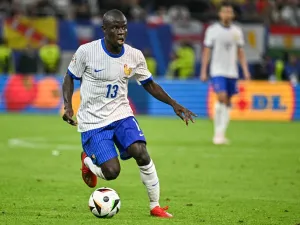 France's midfielder #13 N'golo Kante controls the ball during the UEFA Euro 2024 quarter-final football match between Portugal and France at the Volksparkstadion in Hamburg on July 5, 2024. (Photo by JAVIER SORIANO / AFP)