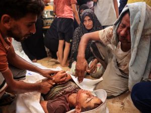 مئات الشهداء والجرحى في مجزرة بخان يونس