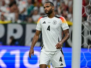 Germany's defender #04 Jonathan Tah reacts after conceding the 1-0 goal during the UEFA Euro 2024 Group A football match between Switzerland and Germany at the Frankfurt Arena in Frankfurt am Main on June 23, 2024. (Photo by Tobias SCHWARZ / AFP)