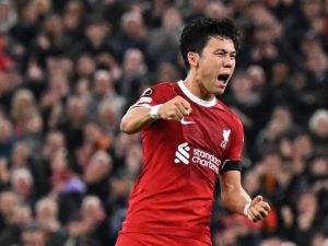 Liverpool's Japanese midfielder #03 Wataru Endo celebrates scoring the team's second goal during the UEFA Europa League group E football match between Liverpool and Toulouse at Anfield in Liverpool, north west England on October 26, 2023. (Photo by Oli SCARFF / AFP) Liverpool's Japanese midfielder #03 Wataru Endo celebrates scoring the team's second goal during the UEFA Europa League group E football match between Liverpool and Toulouse at Anfield in Liverpool, north west England on October 26, 2023. (Photo by Oli SCARFF / AFP)