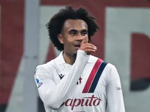 Bologna's Dutch forward #9 Joshua Zirkzee celebrates after scoring the opening goal during the Italian Serie A football match between AC Milan and Bologna at the San Siro Stadium, in Milan on January 27, 2024. (Photo by Piero CRUCIATTI / AFP)
