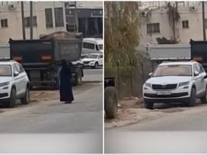 Female beggar in Ramallah
