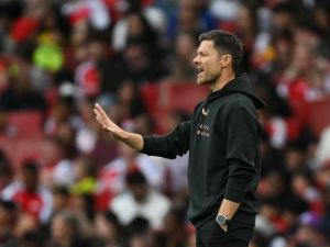 Bayer Leverkusen's Spanish head coach Xabi Alonso reacts from the sideline during the pre-season friendly football match between Arsenal and Bayer 04 Leverkusen at the Emirates Stadium in London on August 7, 2024. (Photo by Glyn KIRK / AFP)