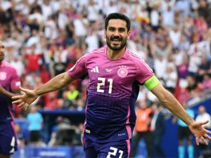 Germany's midfielder #21 Ilkay Gundogan celebrates scoring his team's second goal during the UEFA Euro 2024 Group A football match between Germany and Hungary at the Stuttgart Arena in Stuttgart on June 19, 2024. (Photo by THOMAS KIENZLE / AFP) Germany's midfielder #21 Ilkay Gundogan celebrates scoring his team's second goal during the UEFA Euro 2024 Group A football match between Germany and Hungary at the Stuttgart Arena in Stuttgart on June 19, 2024. (Photo by THOMAS KIENZLE / AFP)