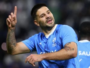 Hilal's Serbian forward #09 Aleksandar Mitrovic celebrates after scoring his team's third goal during the AFC Champions League football match between Saudi Arabia's Al-Hilal SFC and Iran’s Sepahan FC at the Kingdom Arena Stadium in Riyadh on February 22, 2024. (Photo by Fayez NURELDINE / AFP) Hilal's Serbian forward #09 Aleksandar Mitrovic celebrates after scoring his team's third goal during the AFC Champions League football match between Saudi Arabia's Al-Hilal SFC and Iran’s Sepahan FC at the Kingdom Arena Stadium in Riyadh on February 22, 2024. (Photo by Fayez NURELDINE / AFP)