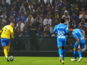 Nassr's Portuguese forward #07 Cristiano Ronaldo controls the ball during the Riyadh Season Cup final match between Al-Nassr and Al-Hilal at the Kingdom Arena in Riyadh, on February 8, 2024. (Photo by Fayez Nureldine / AFP)