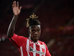 Athletic Bilbao's Spanish forward #11 Nico Williams waves during the Spanish Copa del Rey (King's Cup) final football match between Athletic Club Bilbao and RCD Mallorca at La Cartuja stadium in Seville on April 6, 2024. (Photo by CRISTINA QUICLER / AFP)