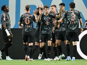 Bayern Munich’s players celebrate a goal during a friendly football match between Tottenham Hotspur and Bayern Munich at the Seoul World Cup Stadium in Seoul on August 3, 2024. (Photo by ANTHONY WALLACE / AFP)
