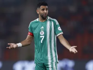 Algeria's forward #7 Riyad Mahrez reacts during the Africa Cup of Nations (CAN) 2024 group D football match between Mauritania and Algeria at Stade de la Paix in Bouake on January 23, 2024. (Photo by KENZO TRIBOUILLARD / AFP)