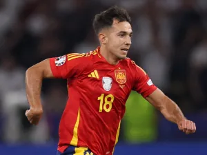 Spain's midfielder #18 Martin Zubimendi runs with the ball during the UEFA Euro 2024 final football match between Spain and England at the Olympiastadion in Berlin on July 14, 2024. (Photo by Adrian DENNIS / AFP)