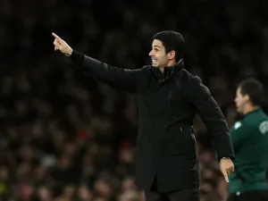 Arsenal's Spanish manager Mikel Arteta shouts instructions to the players from the touchline during the UEFA Champions League football match between Arsenal and Paris Saint-Germain (PSG) at the Emirates Stadium in north London on October 1, 2024. (Photo by Glyn KIRK / AFP)