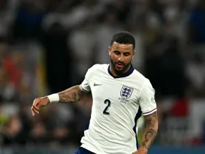 England's defender #02 Kyle Walker runs with the ball during the UEFA Euro 2024 semi-final football match between the Netherlands and England at the BVB Stadion in Dortmund on July 10, 2024. (Photo by OZAN KOSE / AFP)
