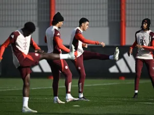 Bayern Munich's German midfielder #42 Jamal Musiala and Bayern Munich's French midfielder #17 Michael Olise (R) attend a training session on the eve of the UEFA Champions League football match FC Bayern Munich vs SL Benfica in Munich, southern Germany, on November 5, 2024. (Photo by Tobias SCHWARZ / AFP)