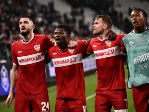 tuttgart's German defender #24 Jeff Chabot, Stuttgart's Malian forward #10 El Bilal Toure and Stuttgart's German defender #07 Maximilian Mittelstaedt and Stuttgart's German midfielder 43# Raul Paula celebrate after winning 0-1 the Champions League football match between Juventus and VfB Stuttgart at the Allianz stadium in Turin, on October 22, 2024. (Photo by Marco BERTORELLO / AFP)