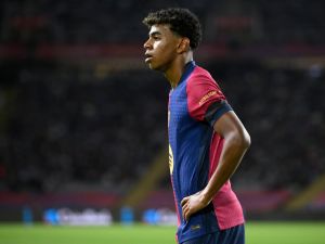 Barcelona's Spanish forward #19 Lamine Yamal stands on the pitch during the Spanish league football match between FC Barcelona and Sevilla FC at the Estadi Olimpic Lluis Companys in Barcelona on October 20, 2024. (Photo by Josep LAGO / AFP)