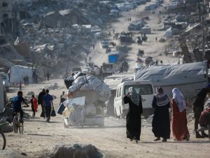 Death and destruction in Gaza as Israel targets residential areas and aid teams