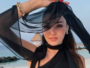 هاندا آرتشيل تسحر العيون بإطلالتها في حفل زفاف سيليو صعب